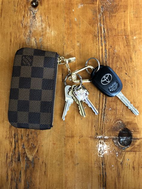 louis vuitton key holder wallet.